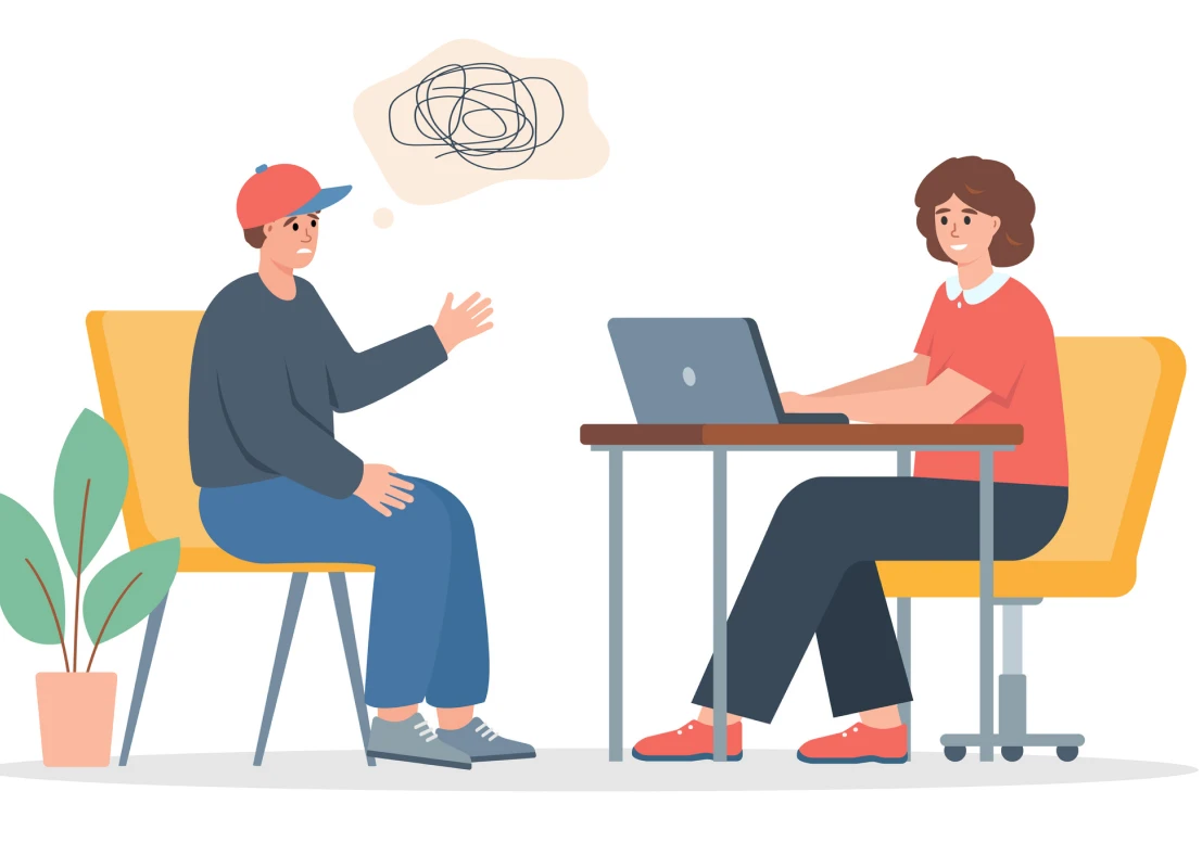 Brainstorming session with laptop and chairs